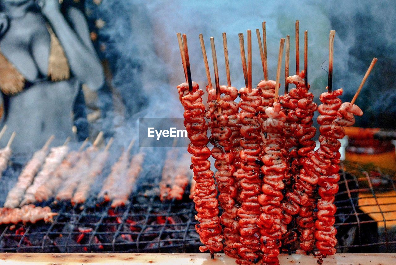 Close-up of meat on barbecue grill