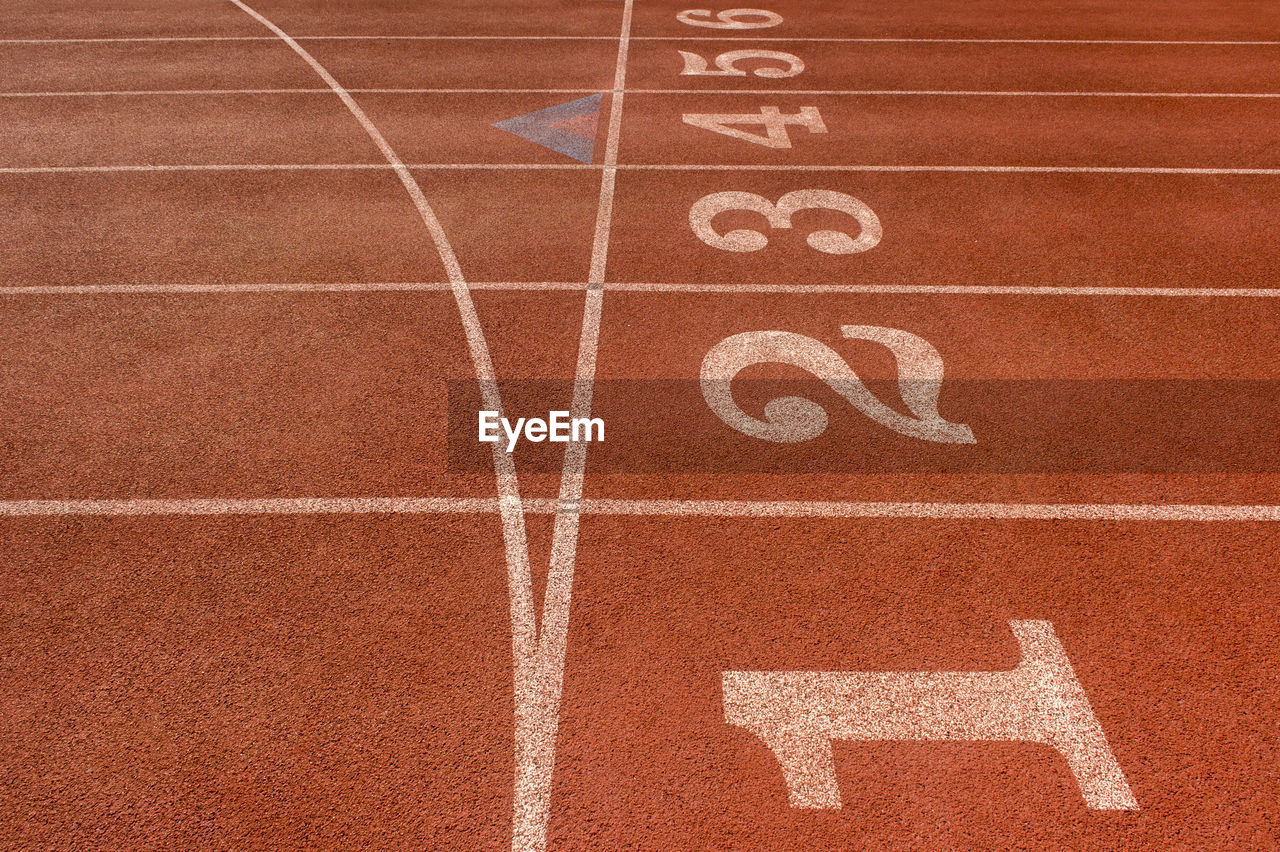Close-up of starting line at running track