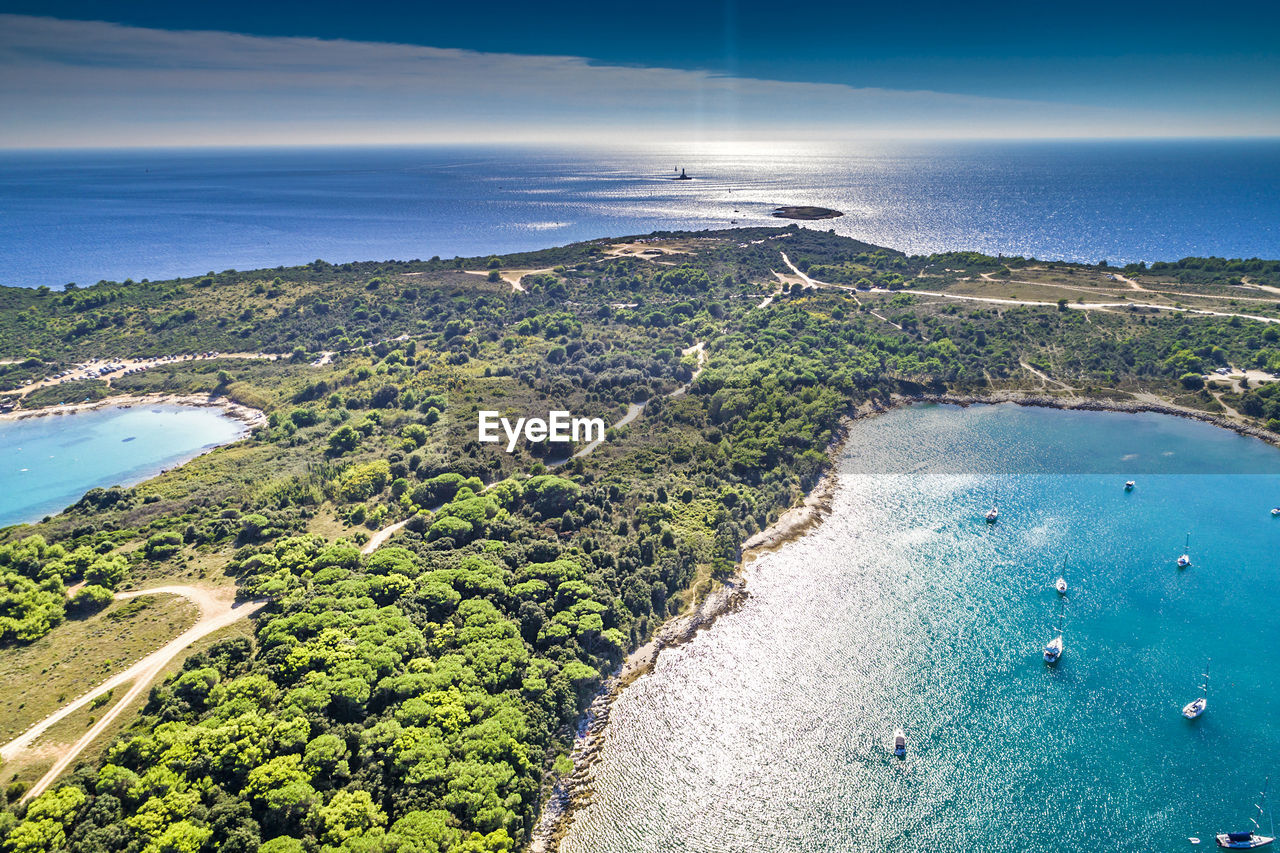 High angle view of bay against sky