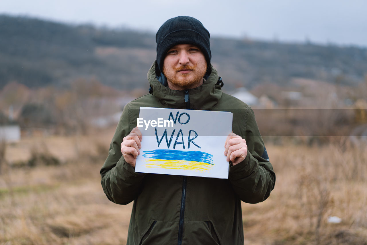 War of russia against ukraine. ukrainian man asks to stop the war in ukraine.