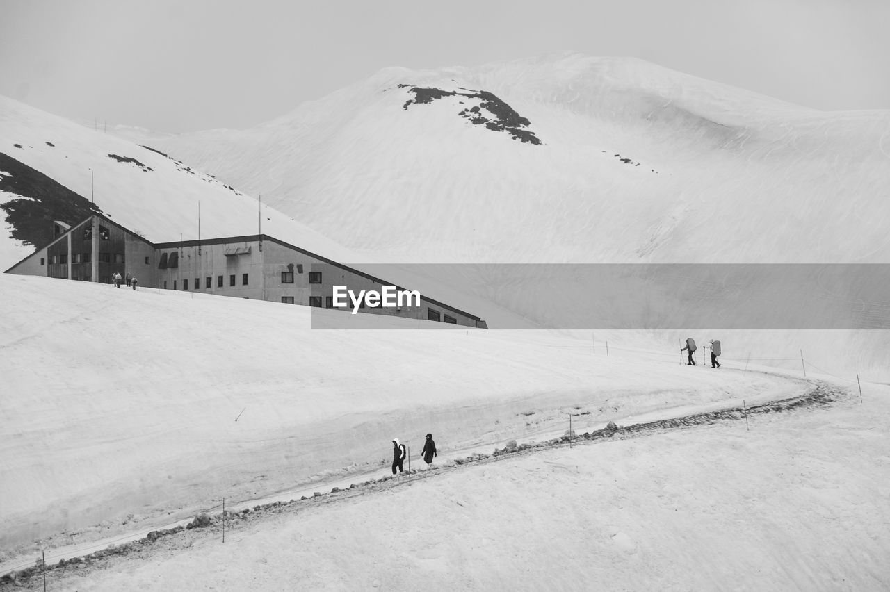 SCENIC VIEW OF SNOW COVERED MOUNTAIN