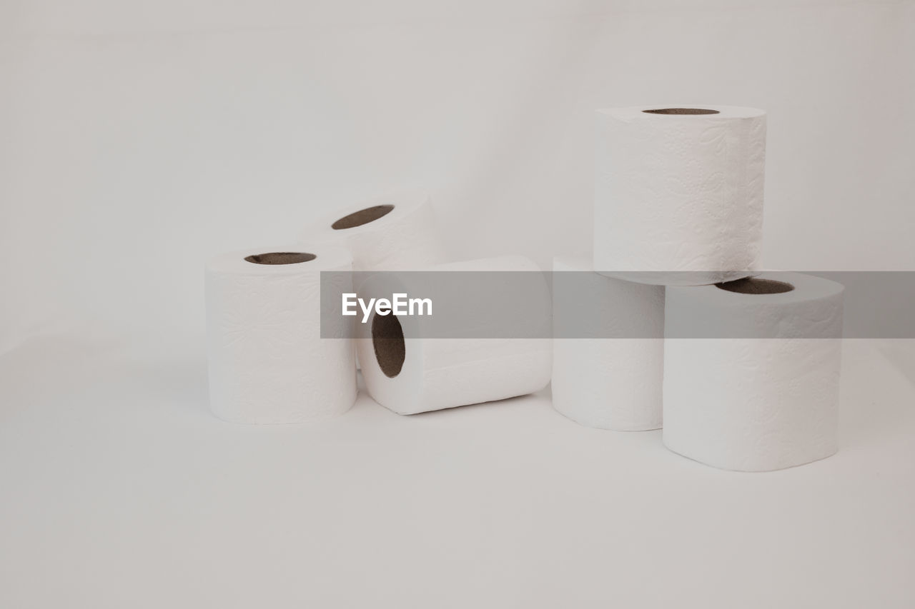 toilet paper, paper towel, paper, cylinder, rolled up, indoors, white, no people, studio shot, hygiene, ceramic, white background