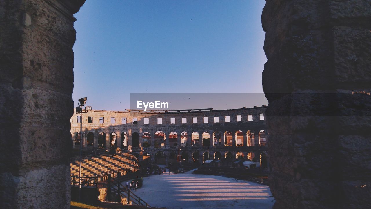 Antic amphitheatre against clear sky