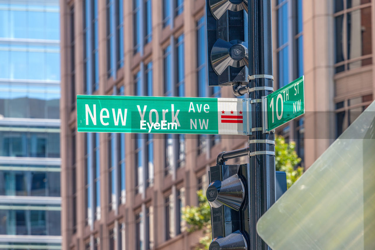 Close up view of road name sign new york avenue nw in city center of washington dc, usa - july, 2018