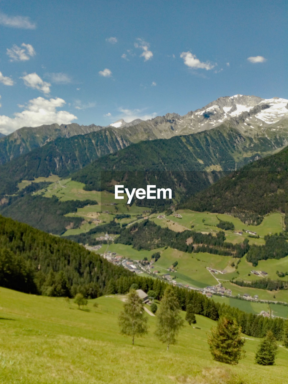 scenic view of landscape and mountains against sky