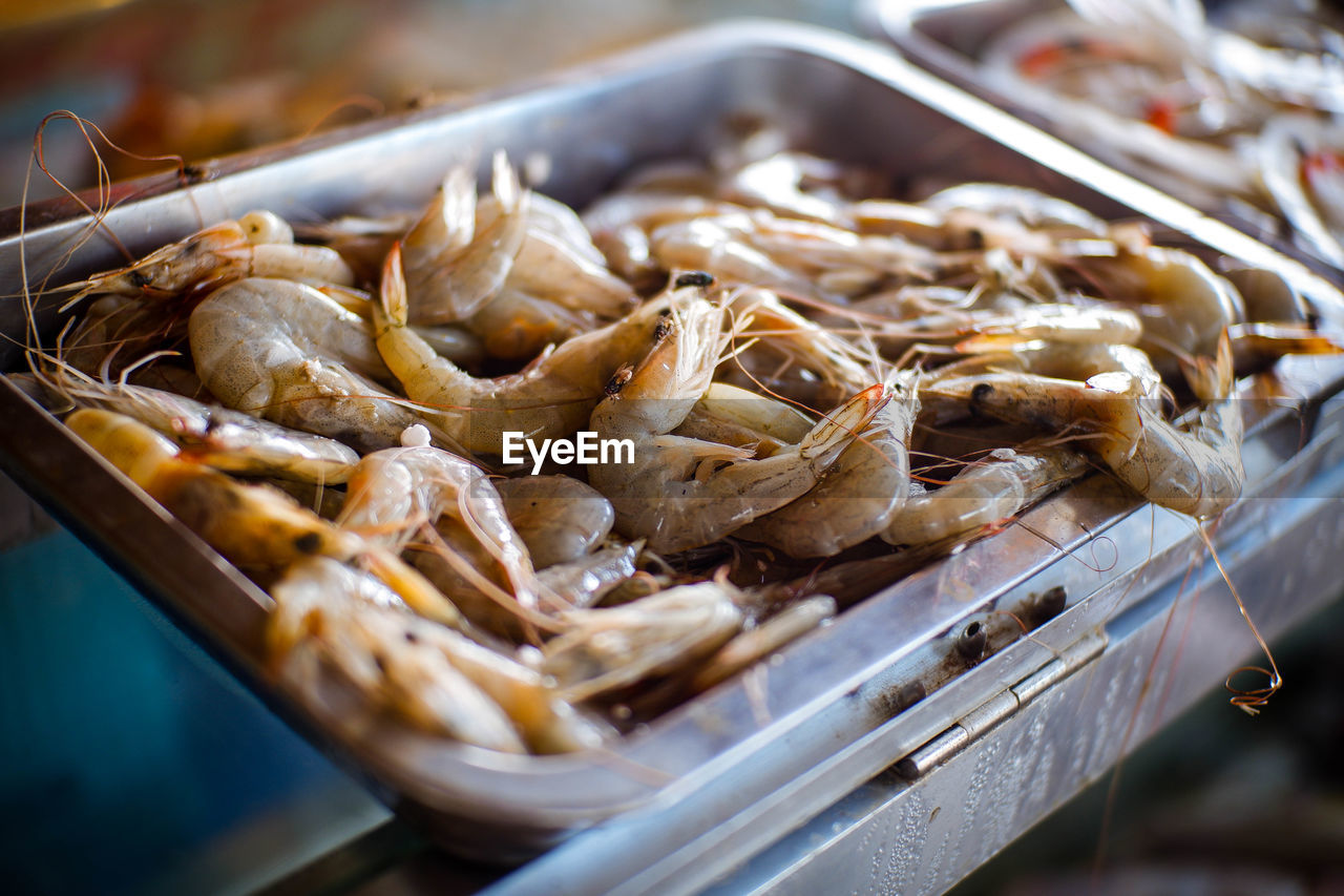 food, food and drink, freshness, dish, meal, no people, cuisine, business finance and industry, healthy eating, market, fast food, abundance, seafood, wellbeing, business, large group of objects, fried, close-up, produce, container, selective focus, meat, heat, asian food, snack, breakfast, baked, retail, market stall, city, travel