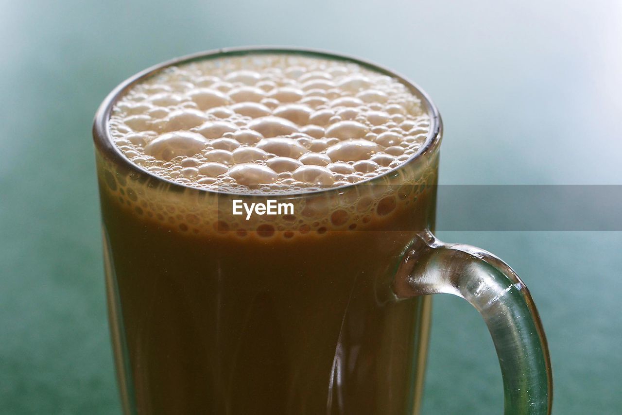 Close-up of coffee cup on table