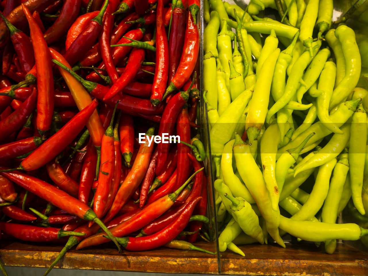 CLOSE-UP OF RED CHILI PEPPERS FOR SALE AT MARKET