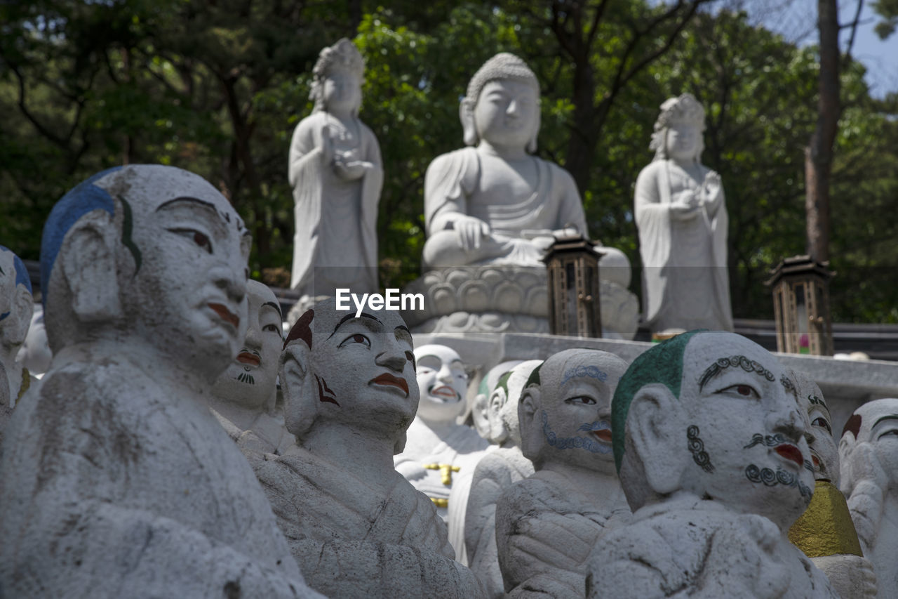 STATUES AGAINST TEMPLE