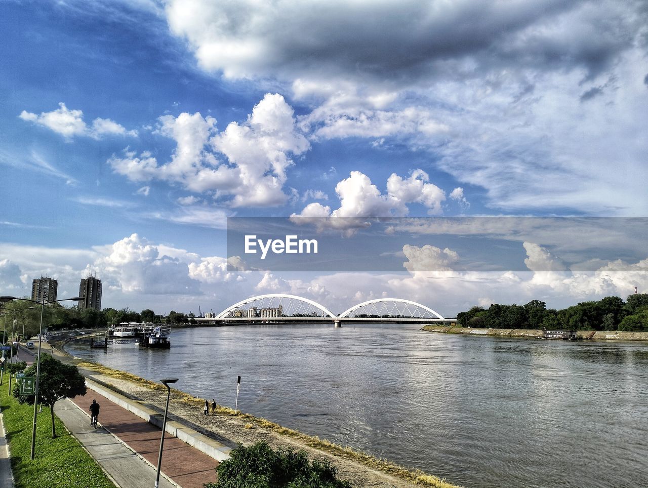 architecture, water, built structure, sky, cloud, bridge, city, travel destinations, travel, building exterior, nature, transportation, river, tourism, cityscape, landscape, building, no people, outdoors, reflection, tree, day, environment, horizon, plant, scenics - nature, reservoir, arts culture and entertainment, vacation, trip, urban skyline, blue, harbor, coast, holiday