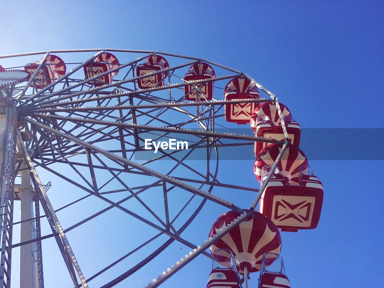 LOW ANGLE VIEW OF FERRIS WHEEL AGAINST SKY