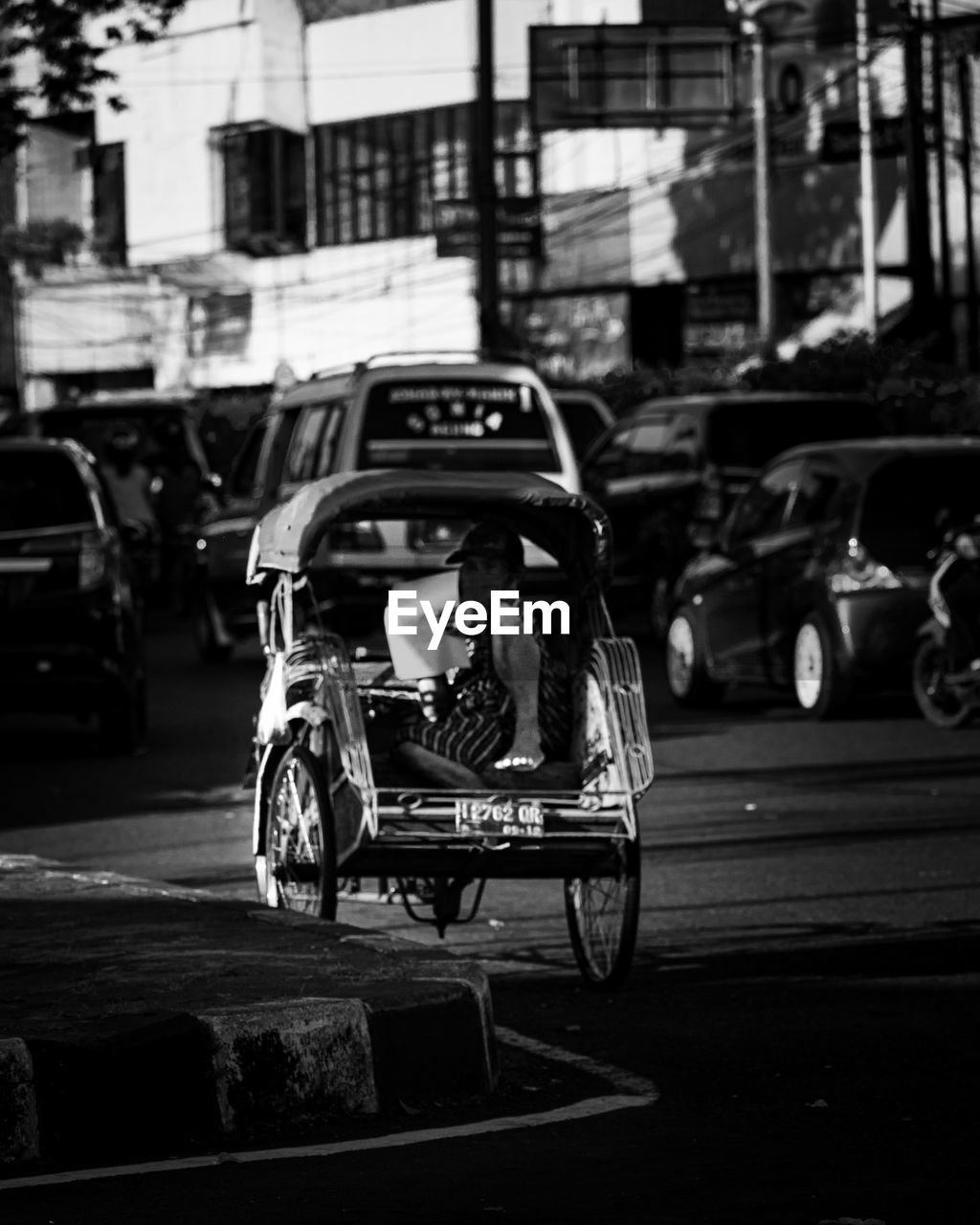 This traditional transportation in indonesia is called becak.