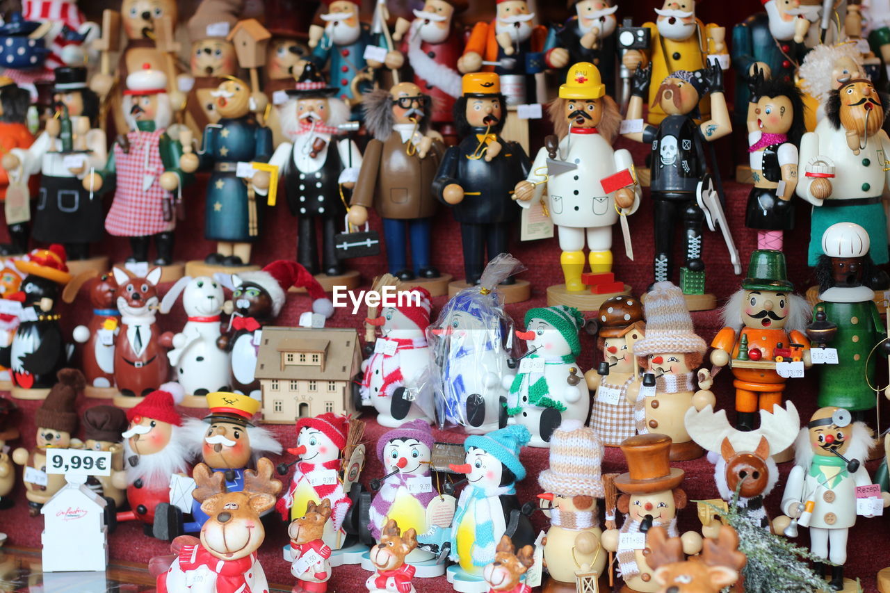 Close-up of toys at market stall for sale