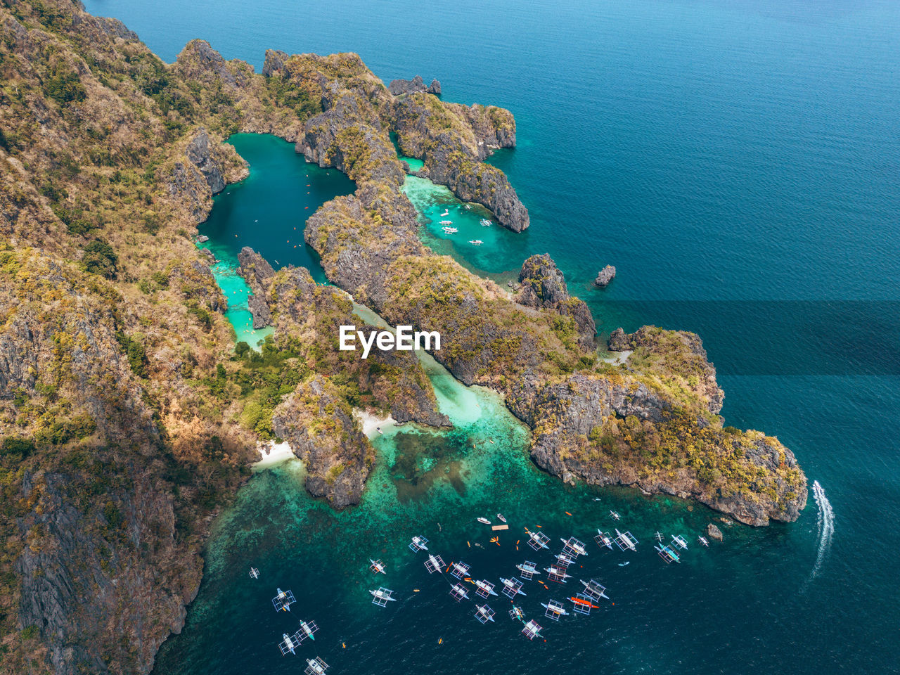 high angle view of rocks in sea