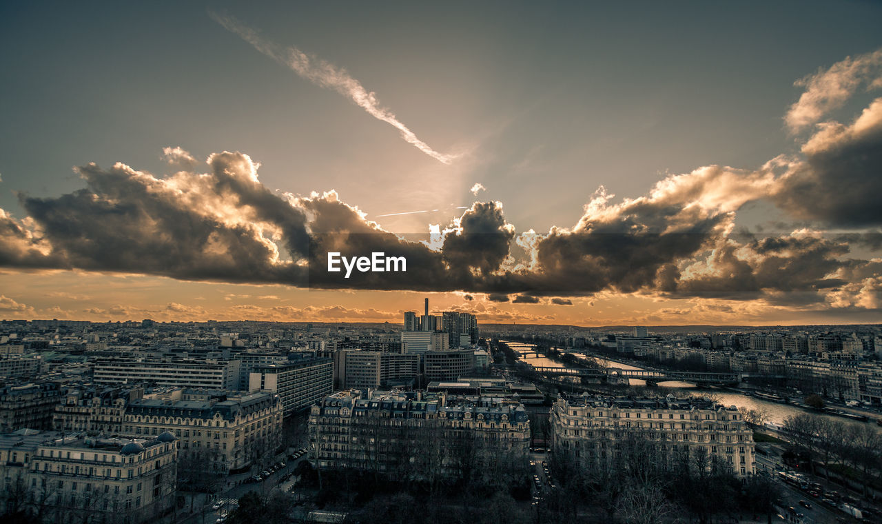 Panoramic view of buildings against sky during sunset