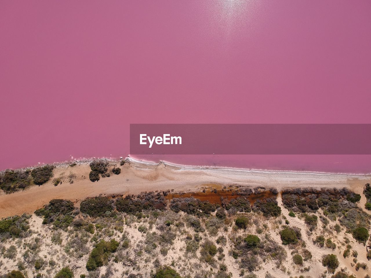 Scenic view of land against clear sky