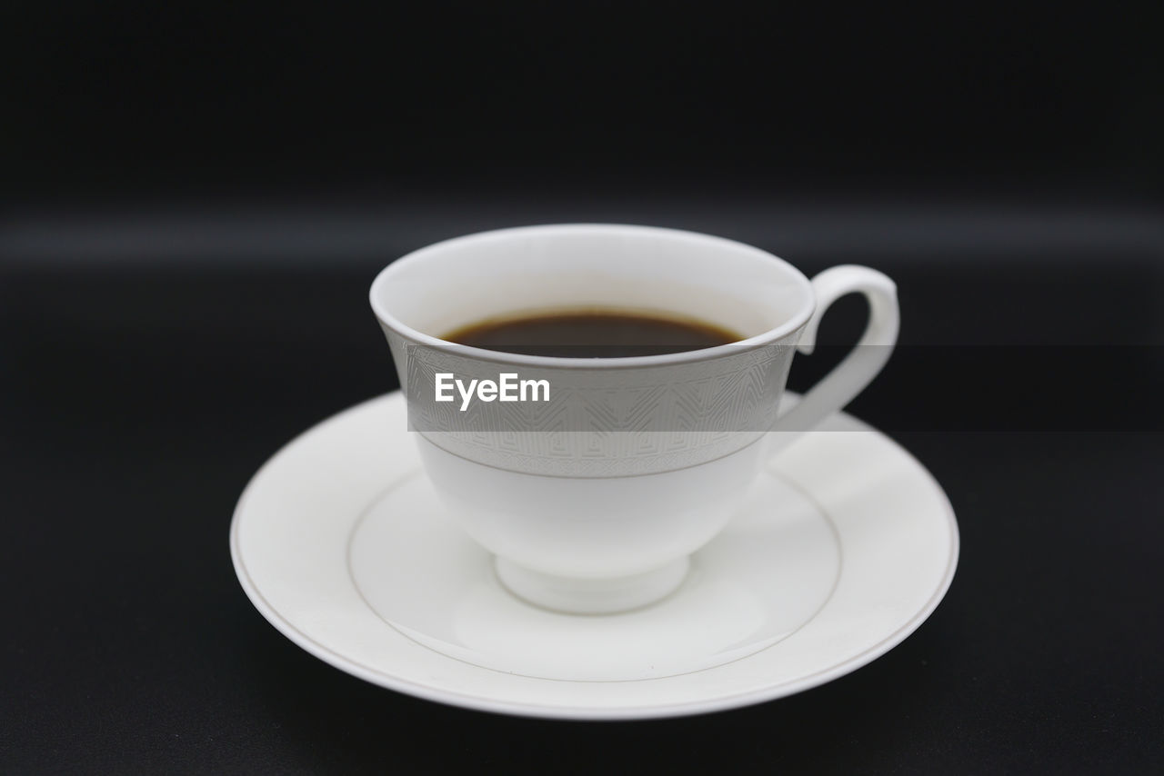 high angle view of coffee cup on table