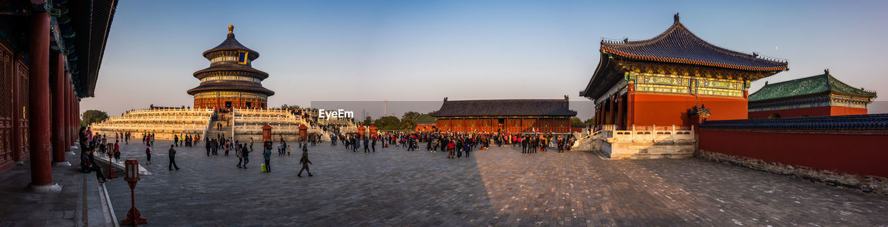 GROUP OF PEOPLE IN TEMPLE