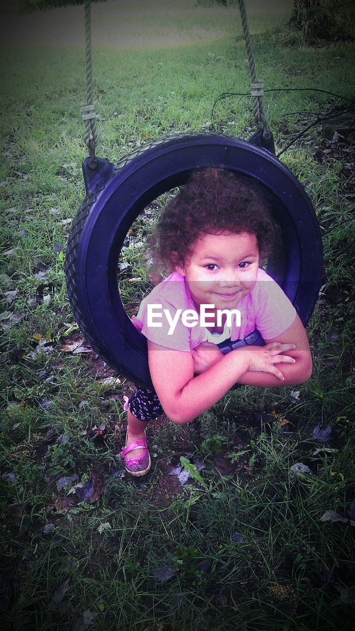 CLOSE-UP PORTRAIT OF GIRL IN PLAYGROUND