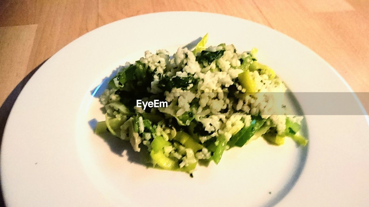 CLOSE-UP OF SERVED FOOD IN PLATE