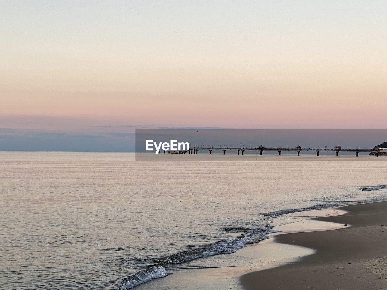 SCENIC VIEW OF SEA DURING SUNSET