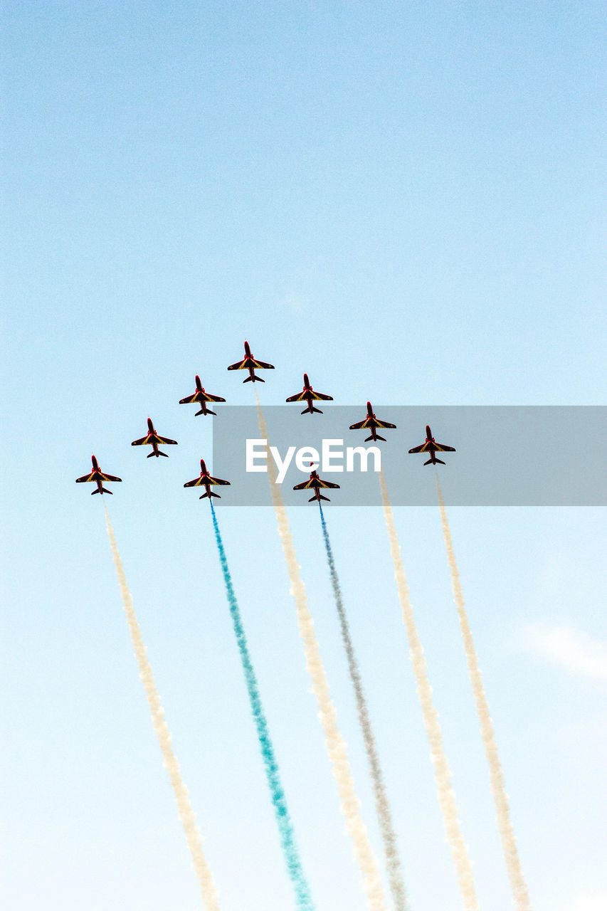 LOW ANGLE VIEW OF AIRPLANE IN SKY