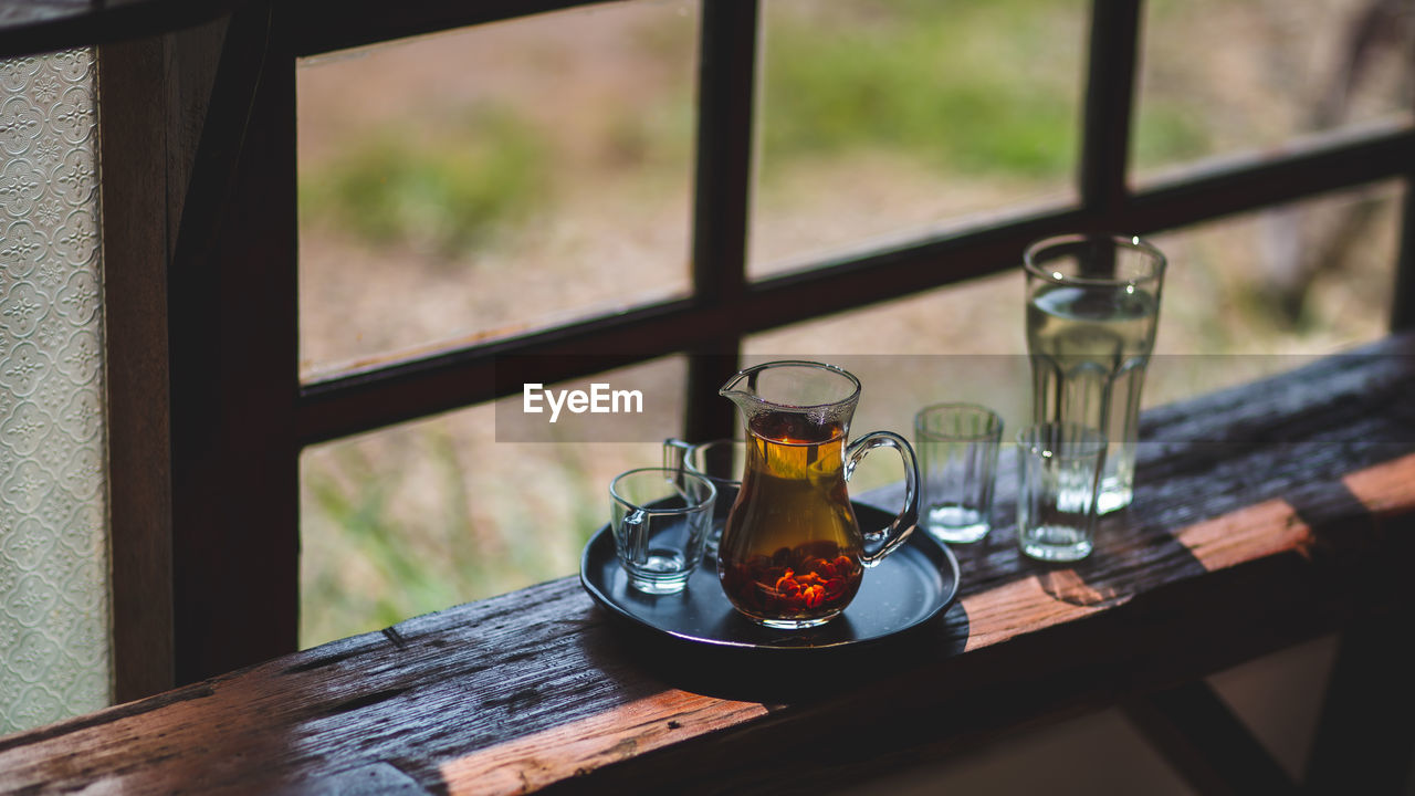 Drink hot tea in a beautifully prepared glass jug ready to serve.