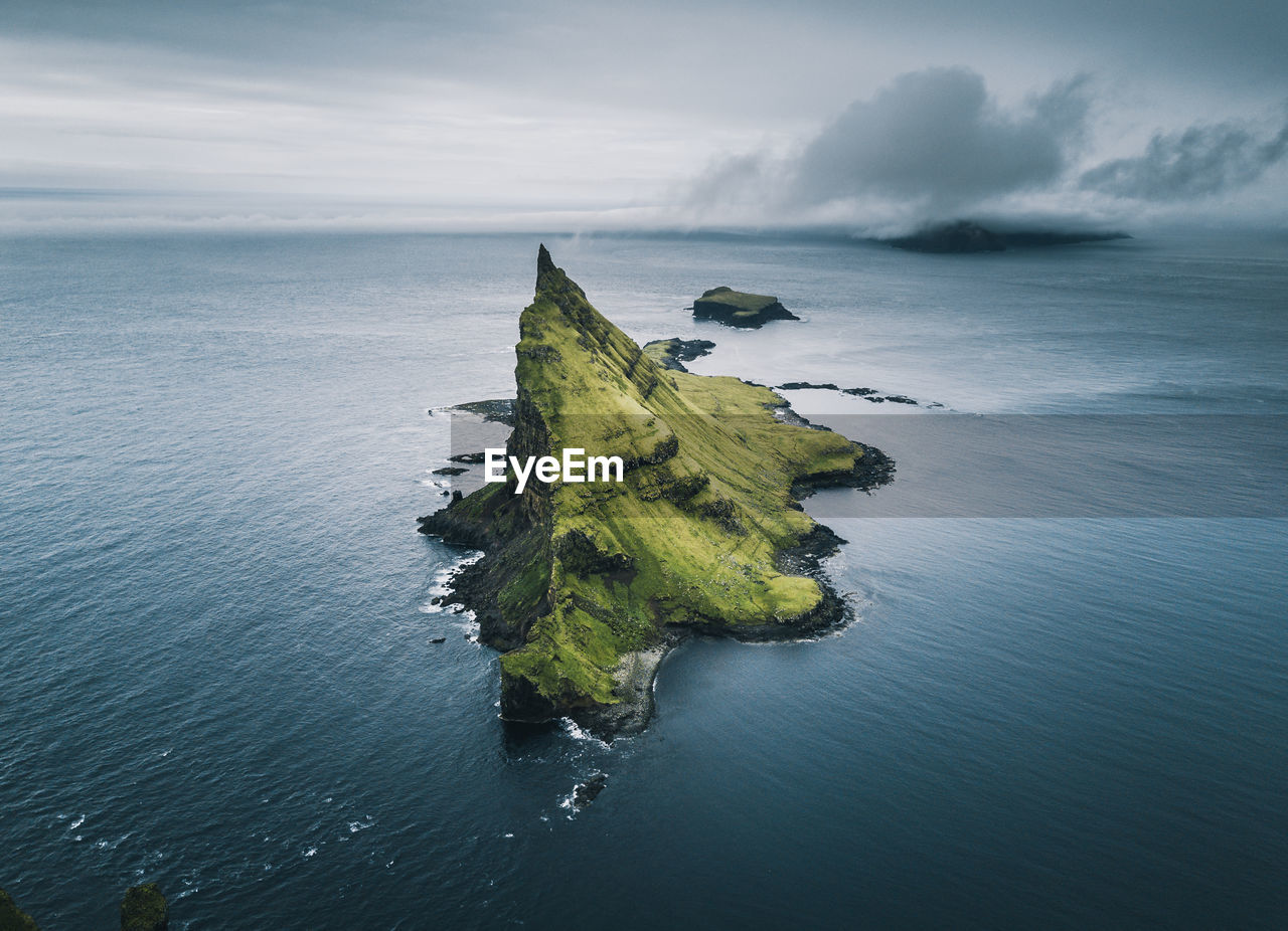 Aerial view of mountain in sea