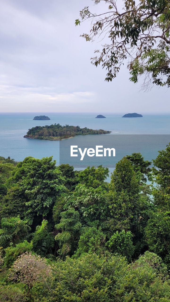 Scenic view of sea against sky with some islands