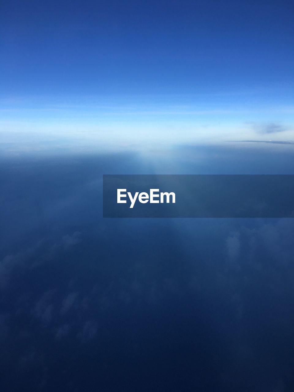 AERIAL VIEW OF CLOUDS OVER SEA