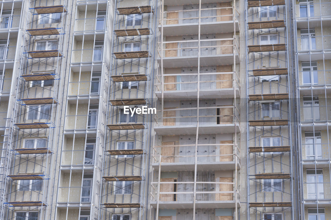 New building in an elite area of the city, construction site. close-up on the balconies.