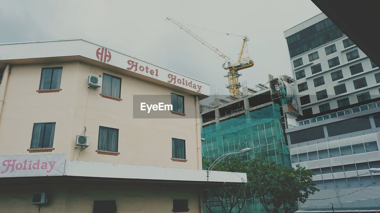 LOW ANGLE VIEW OF RESIDENTIAL BUILDINGS