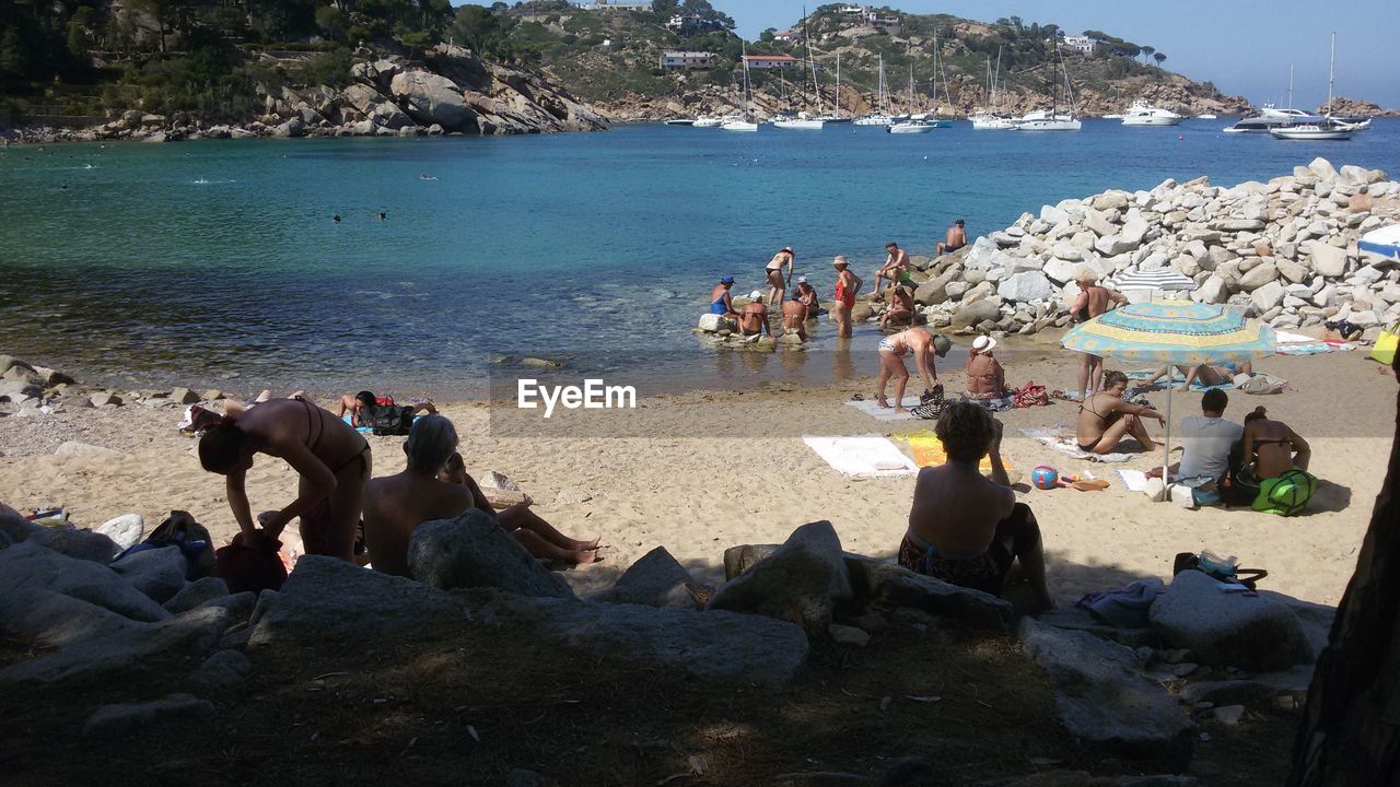 People enjoying at beach