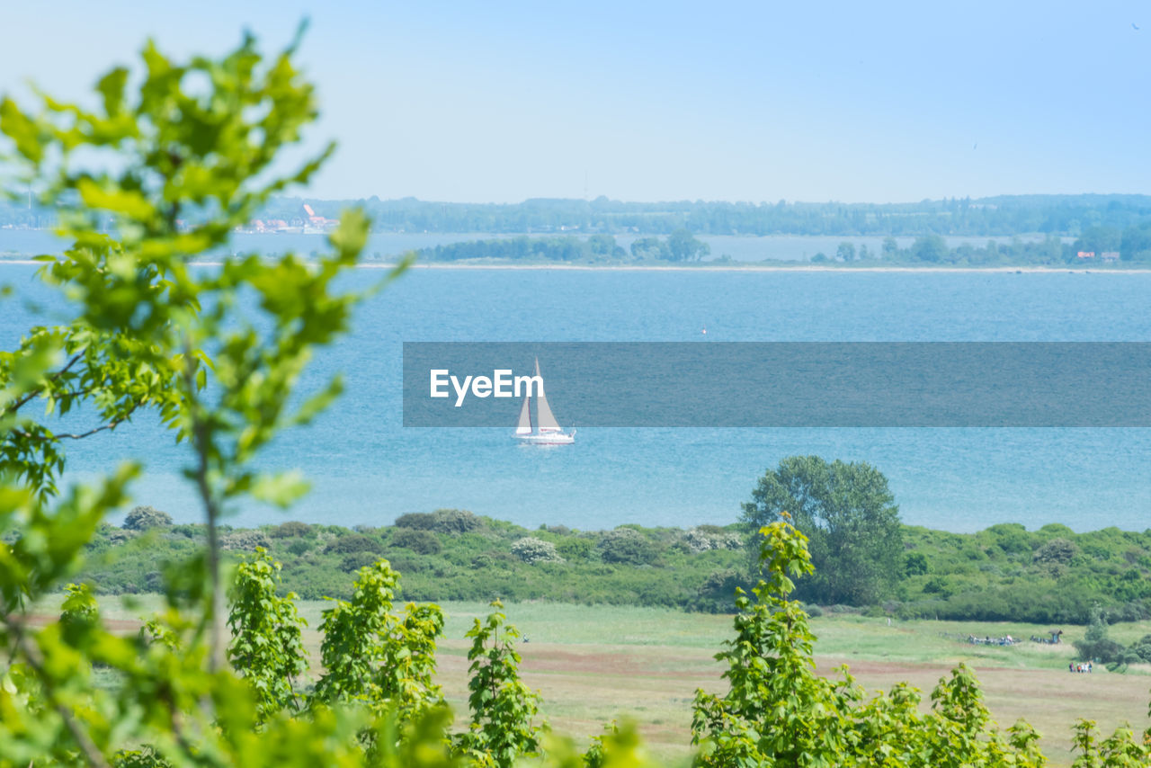 Scenic view of sea against clear sky