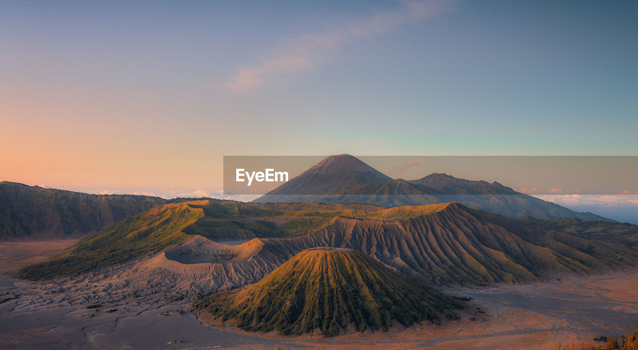 Scenic view of mount bromo against sky during sunrise.