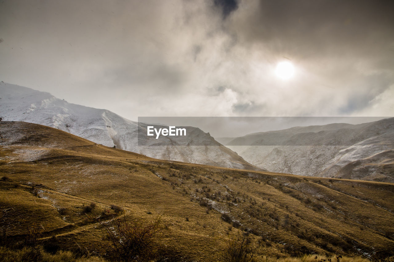 Scenic view of mountains against sky