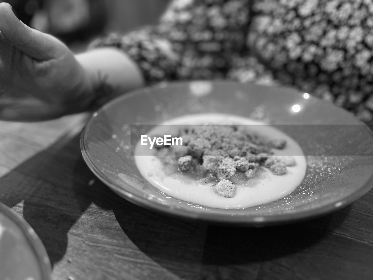 hand, food and drink, food, black, one person, black and white, table, plate, monochrome photography, monochrome, indoors, freshness, holding, white, selective focus, close-up, healthy eating, wellbeing, focus on foreground, adult