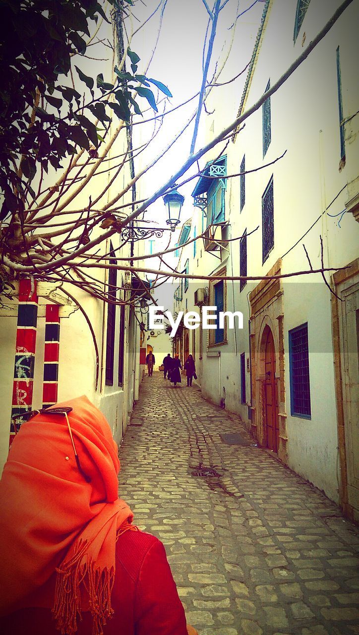 VIEW OF ALLEY ALONG BUILDINGS