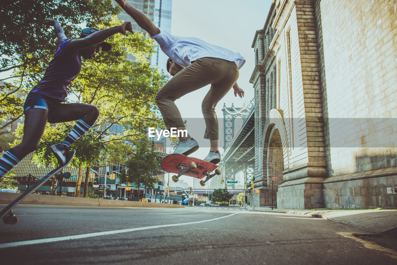 Man jumping in front of building