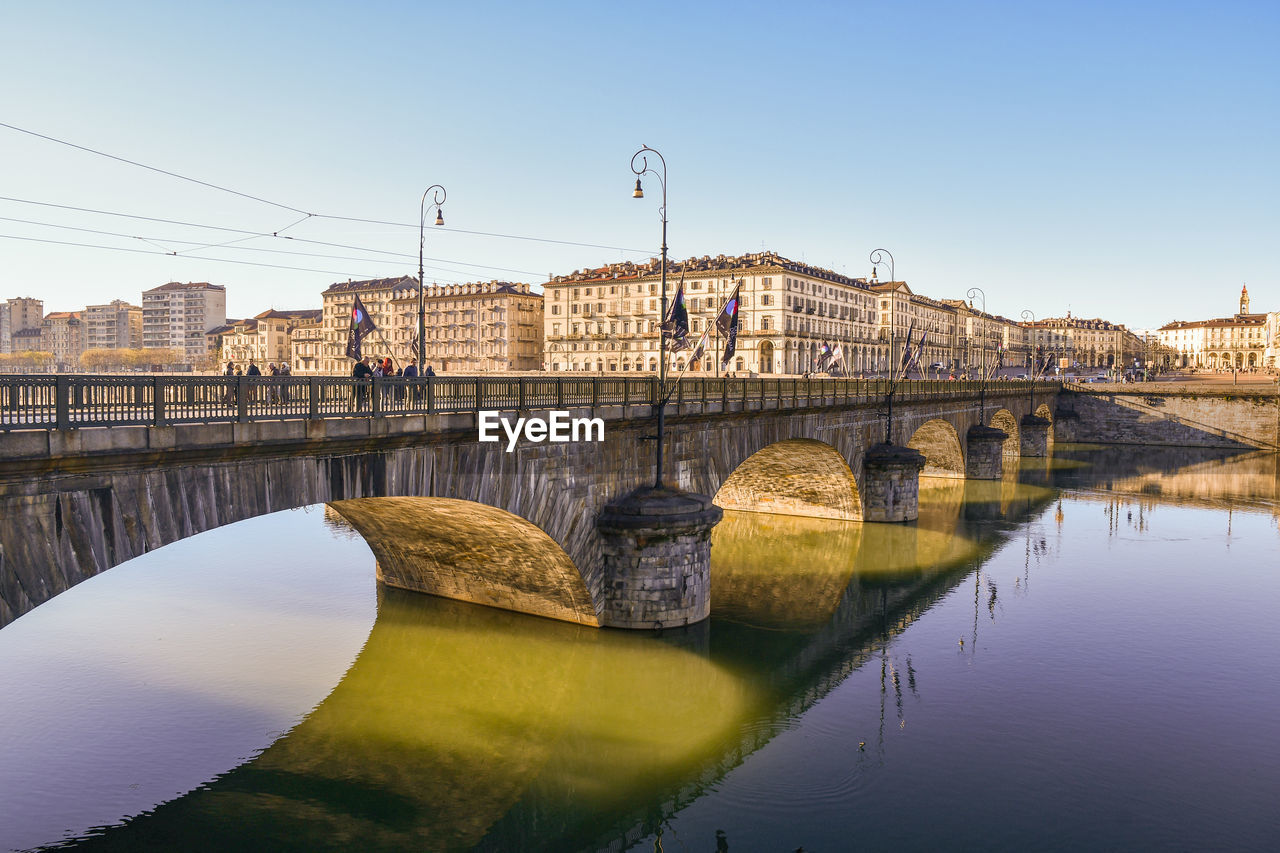 Bridge over river po in turin against clear sky