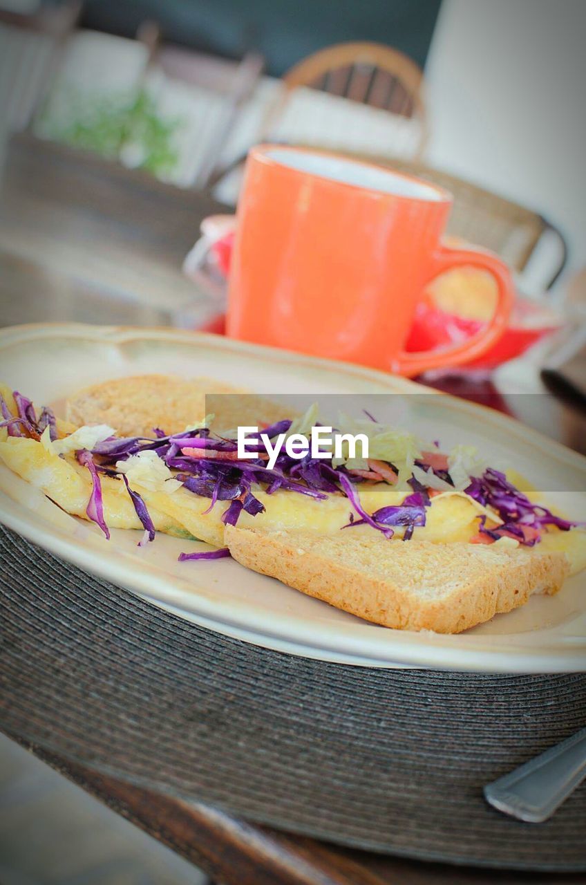 Close-up of breakfast with coffee on table