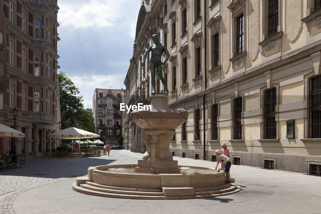 Wroclaw, poland - june 05 2019 - the swordsman's fountain located opposite the university of wroclaw