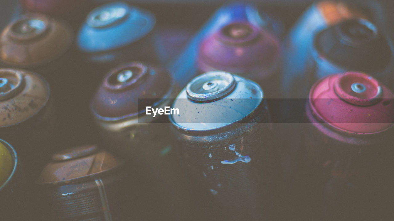 Full frame shot of old spray bottles