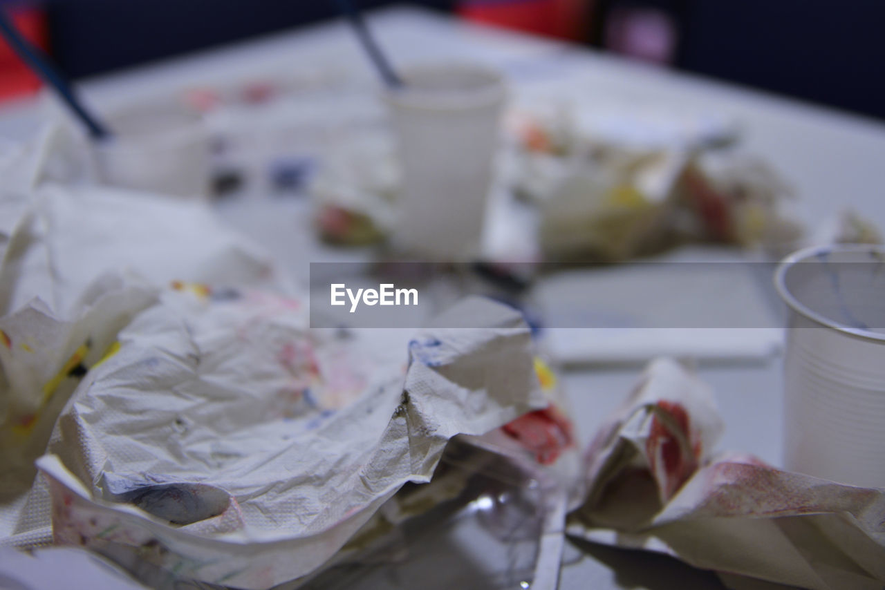 HIGH ANGLE VIEW OF PAPER ON TABLE