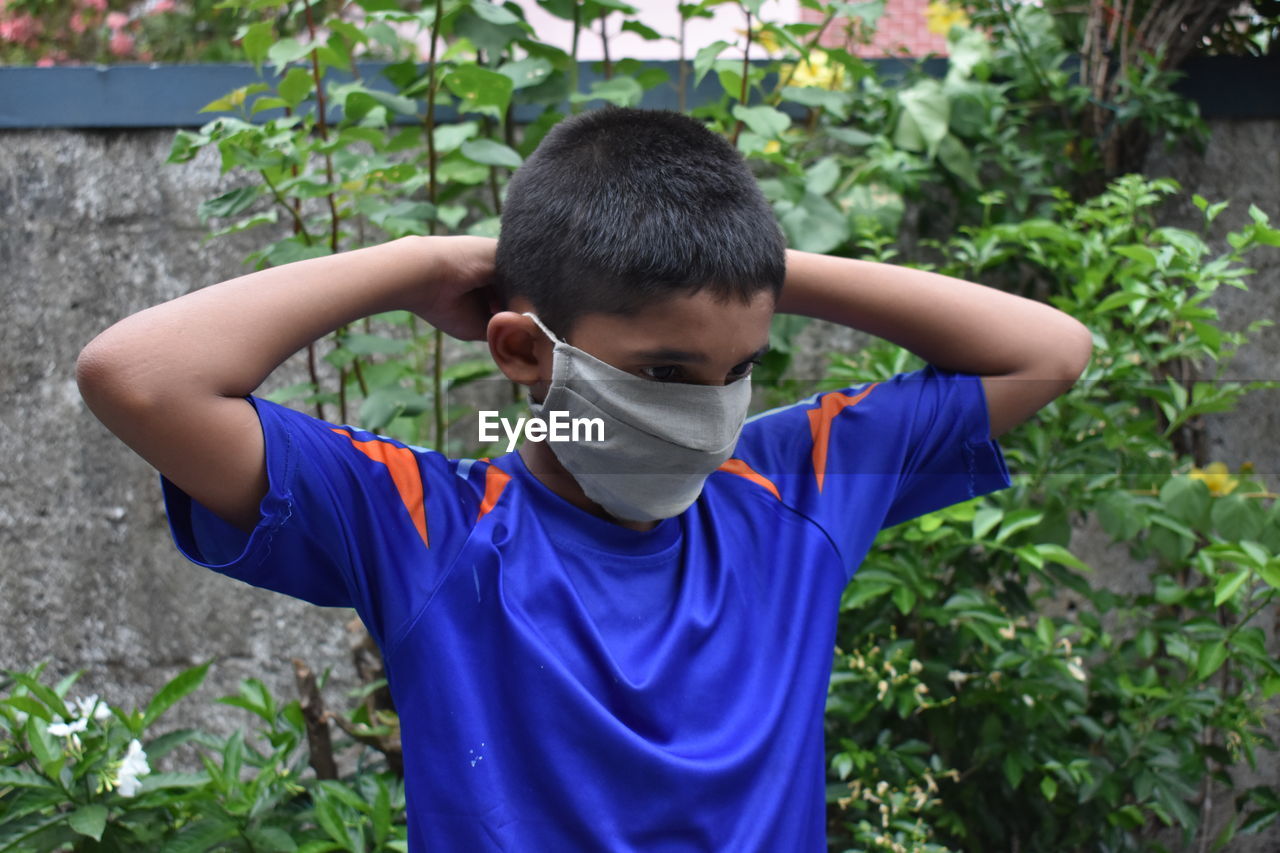 A boy wear mask to protect from coronavirus.