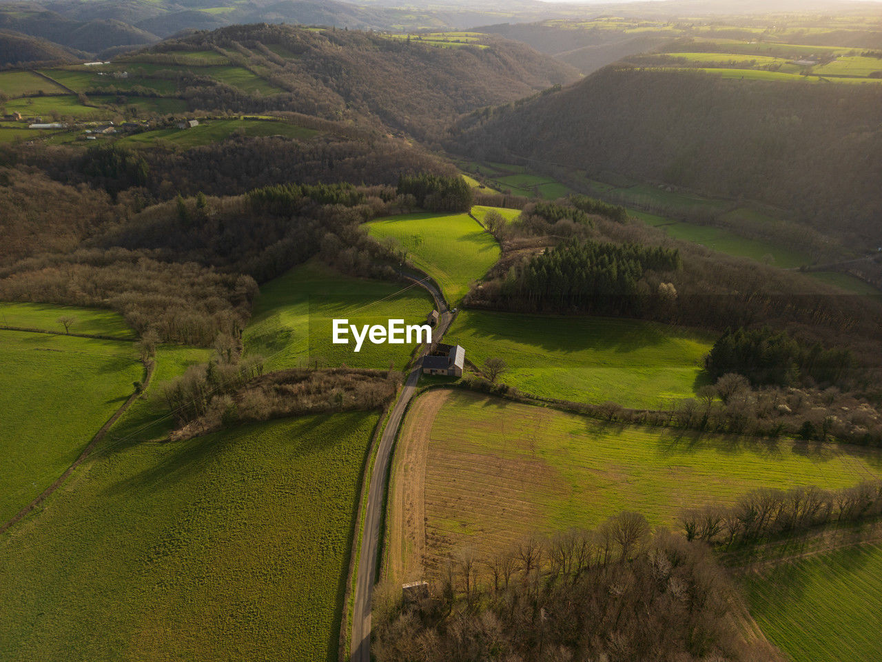 Aerial landscape of green pastures and fields