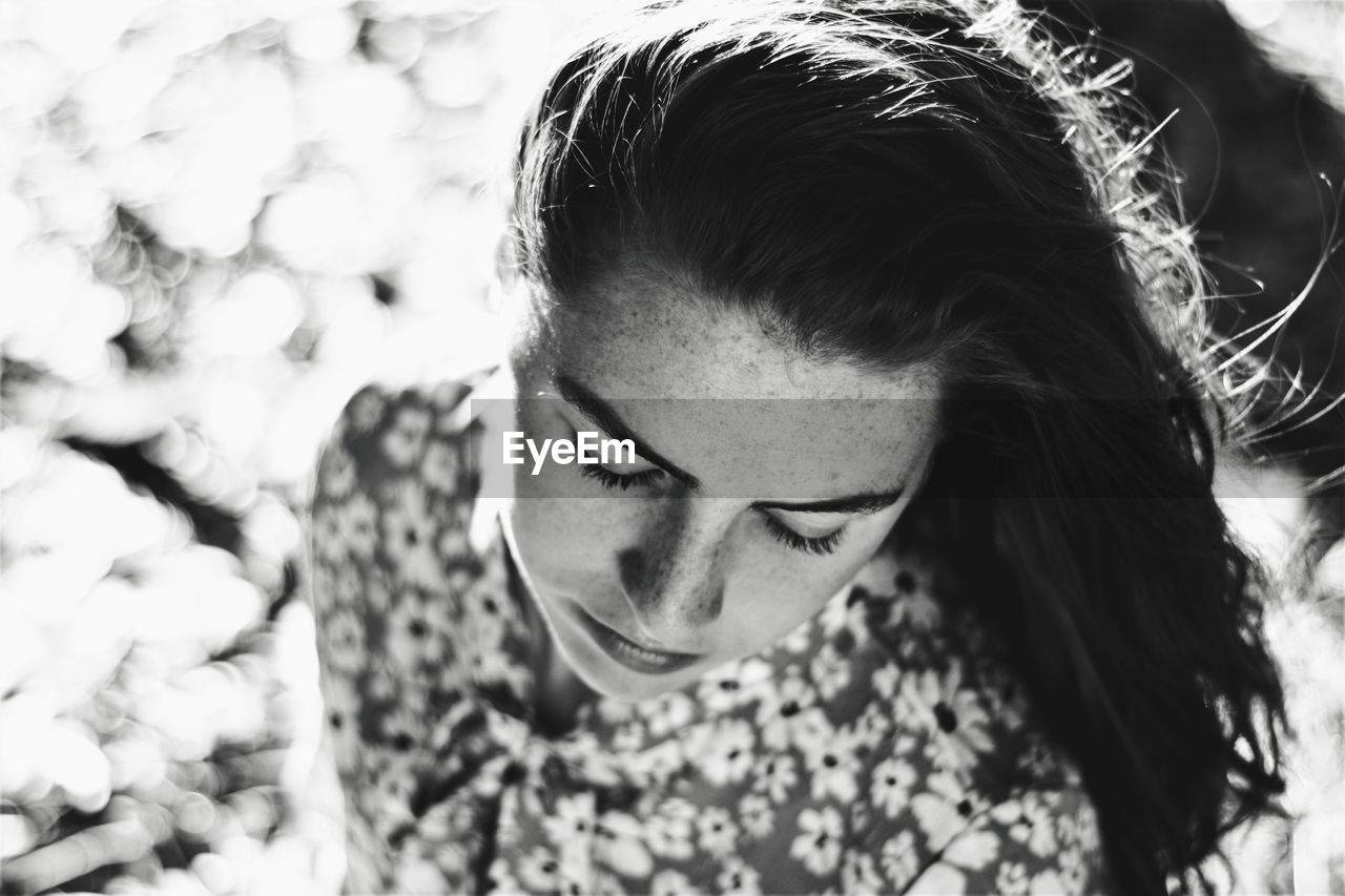 High angle view of teenage girl standing outdoors