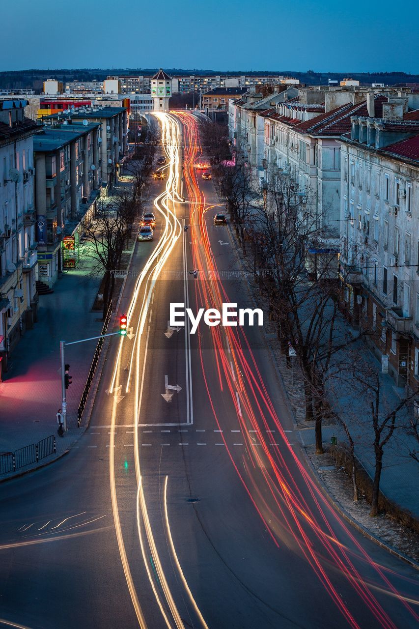 High angle view of light trails on city street