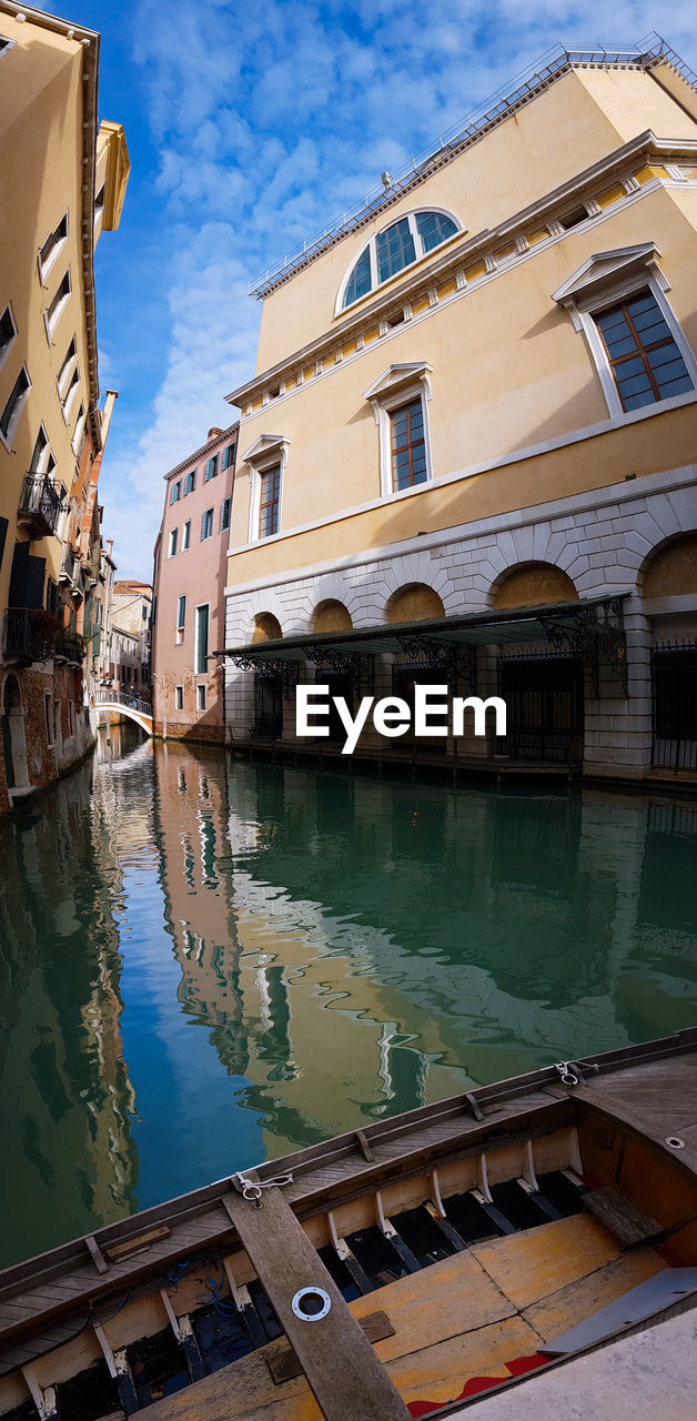 REFLECTION OF BUILDINGS IN WATER