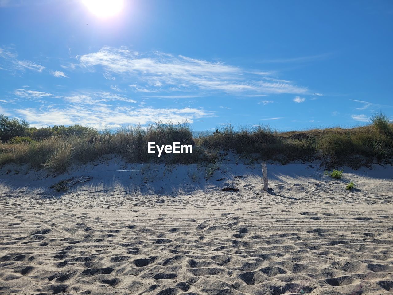 Scenic view of beach  against sky